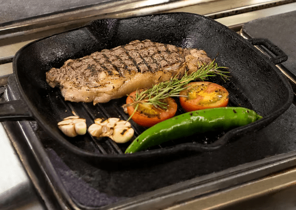Food on a cast iron grill pan