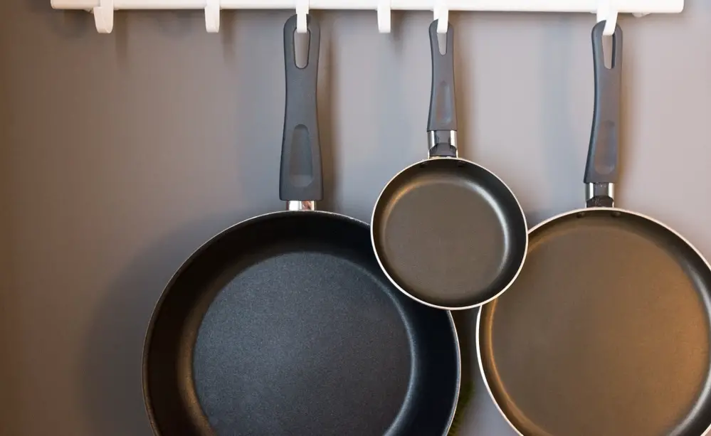 Frying pans hanging in the kitchen