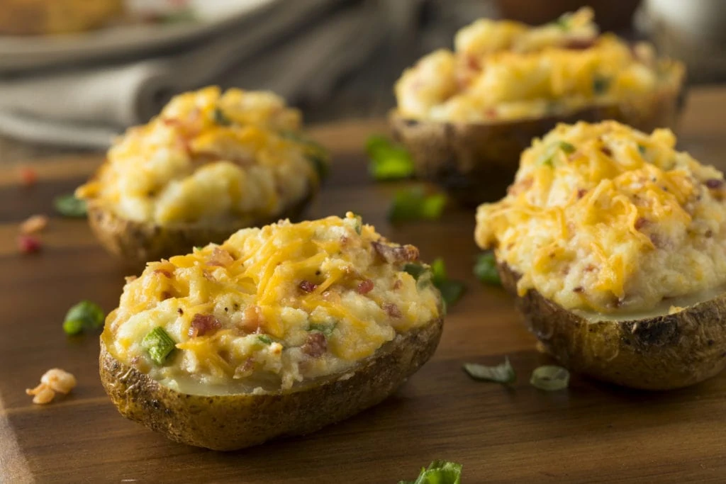 baked potatoes with cheese and chives