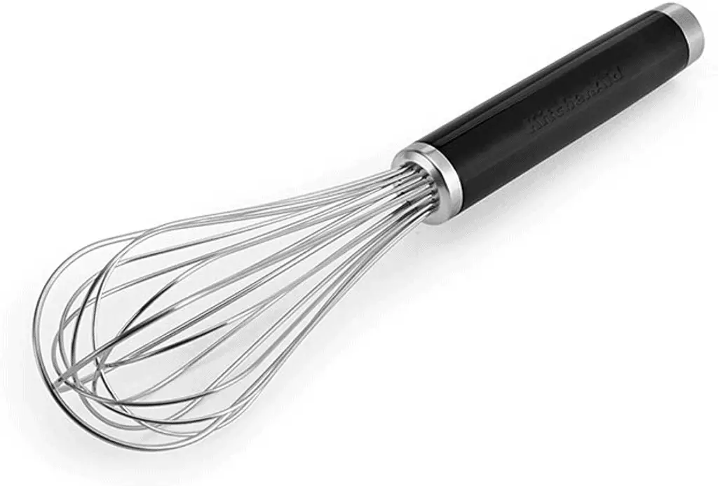 whisk with black handle